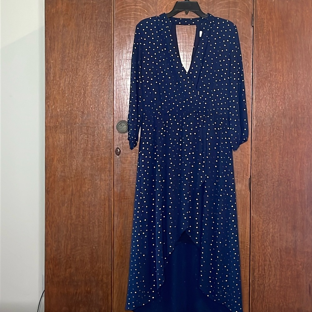 Semi-formal navy faux wrap dress with gold “dots”.